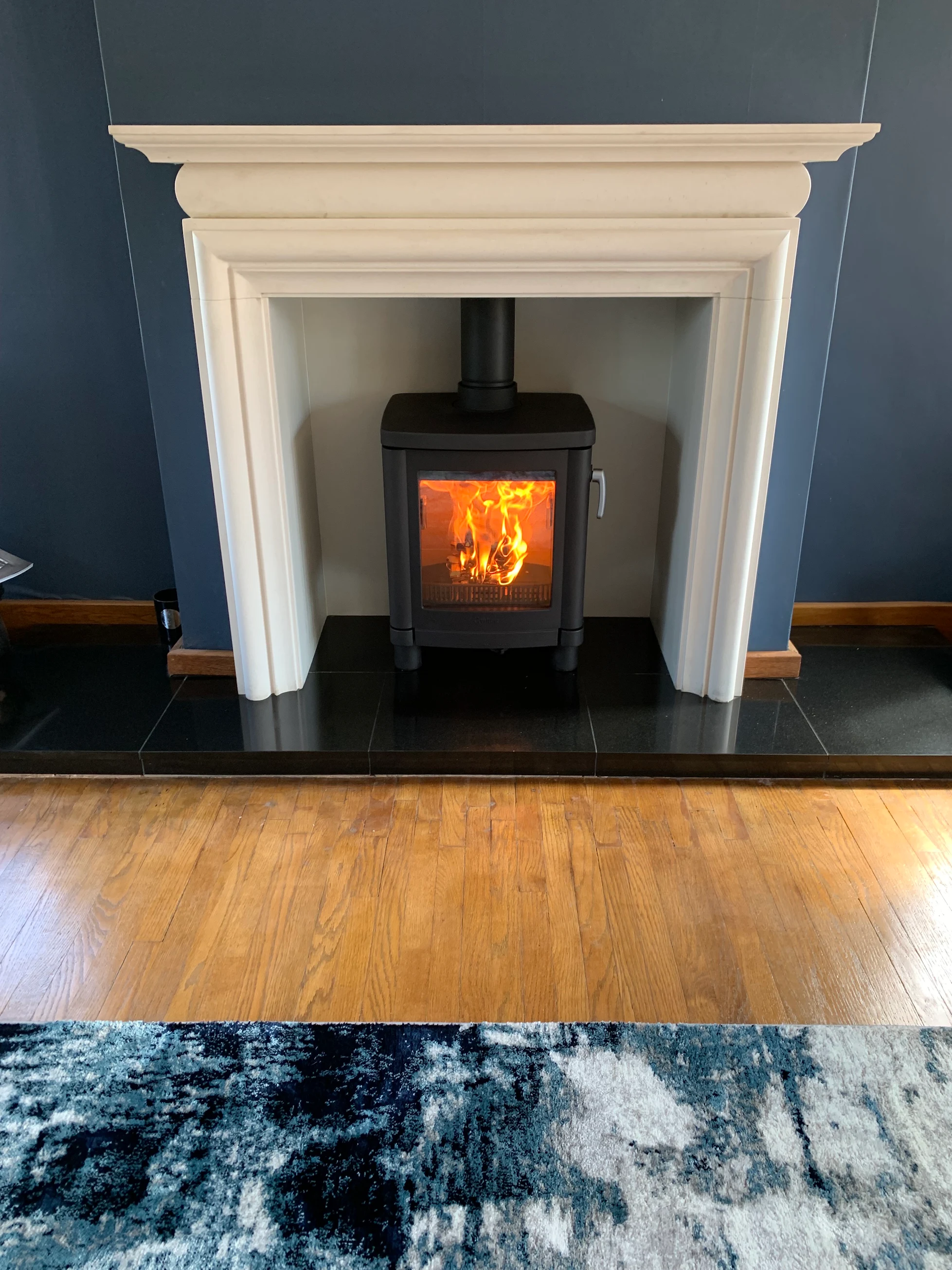 A cast iron Contura 51L wood burning stove supplied and fitted