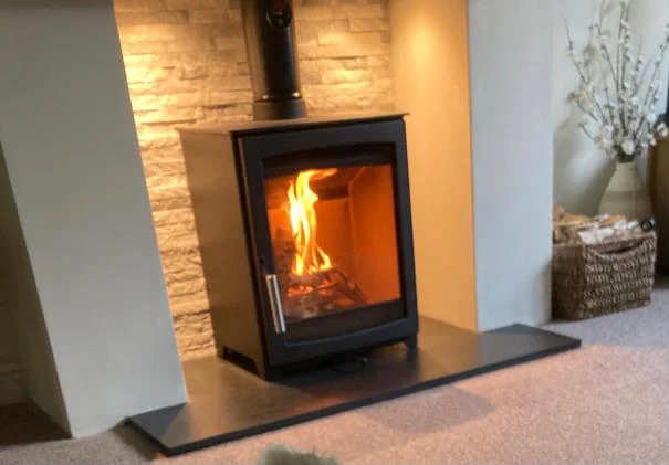 A fireplace and stove supplied and fitted by The Fireplace & Stove Co.