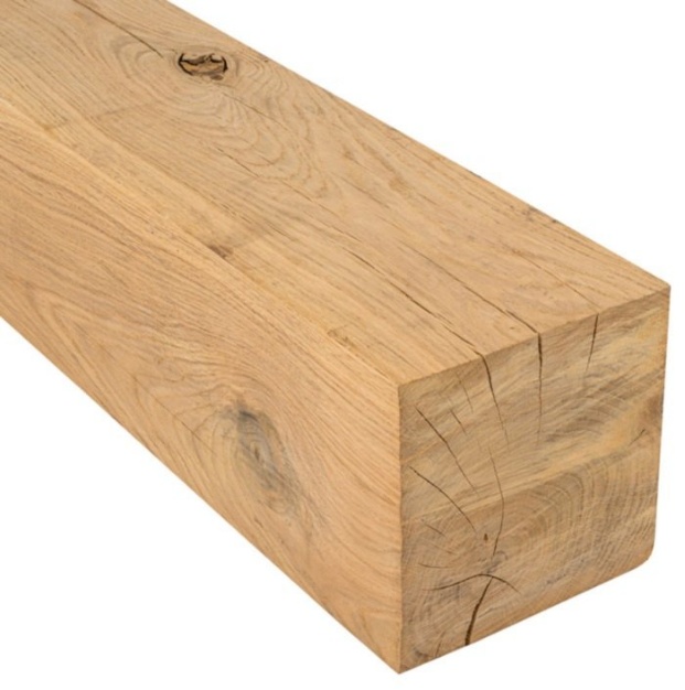 Natural oak beam with character splits and knots selected for the Tamworth fireplace
