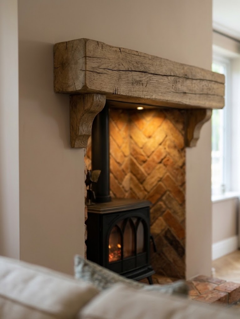 Natural oak beam and matching plain corbels above the Yoxall fireplace opening