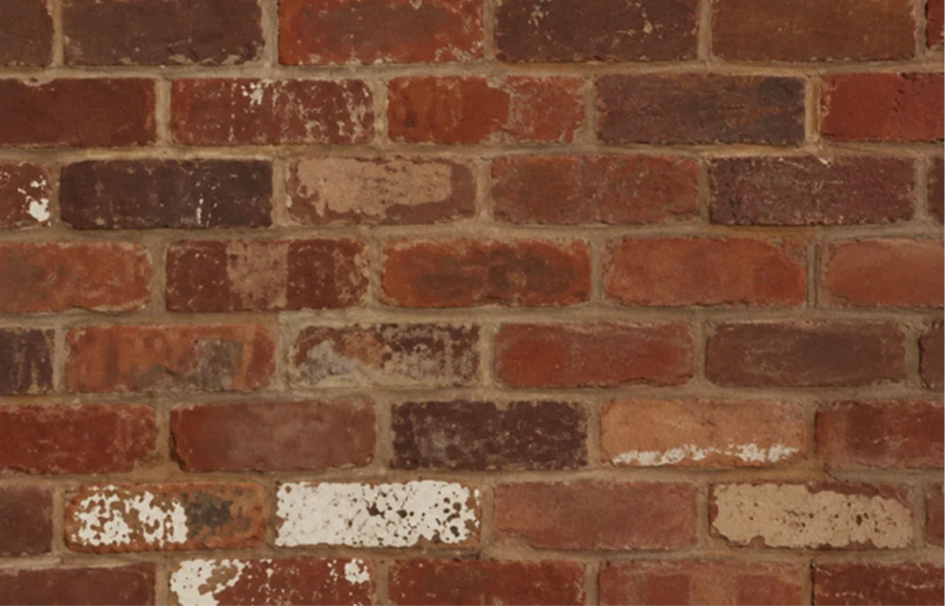 Hand-selected reclaimed brick used for the Yoxall herringbone chamber and hearth