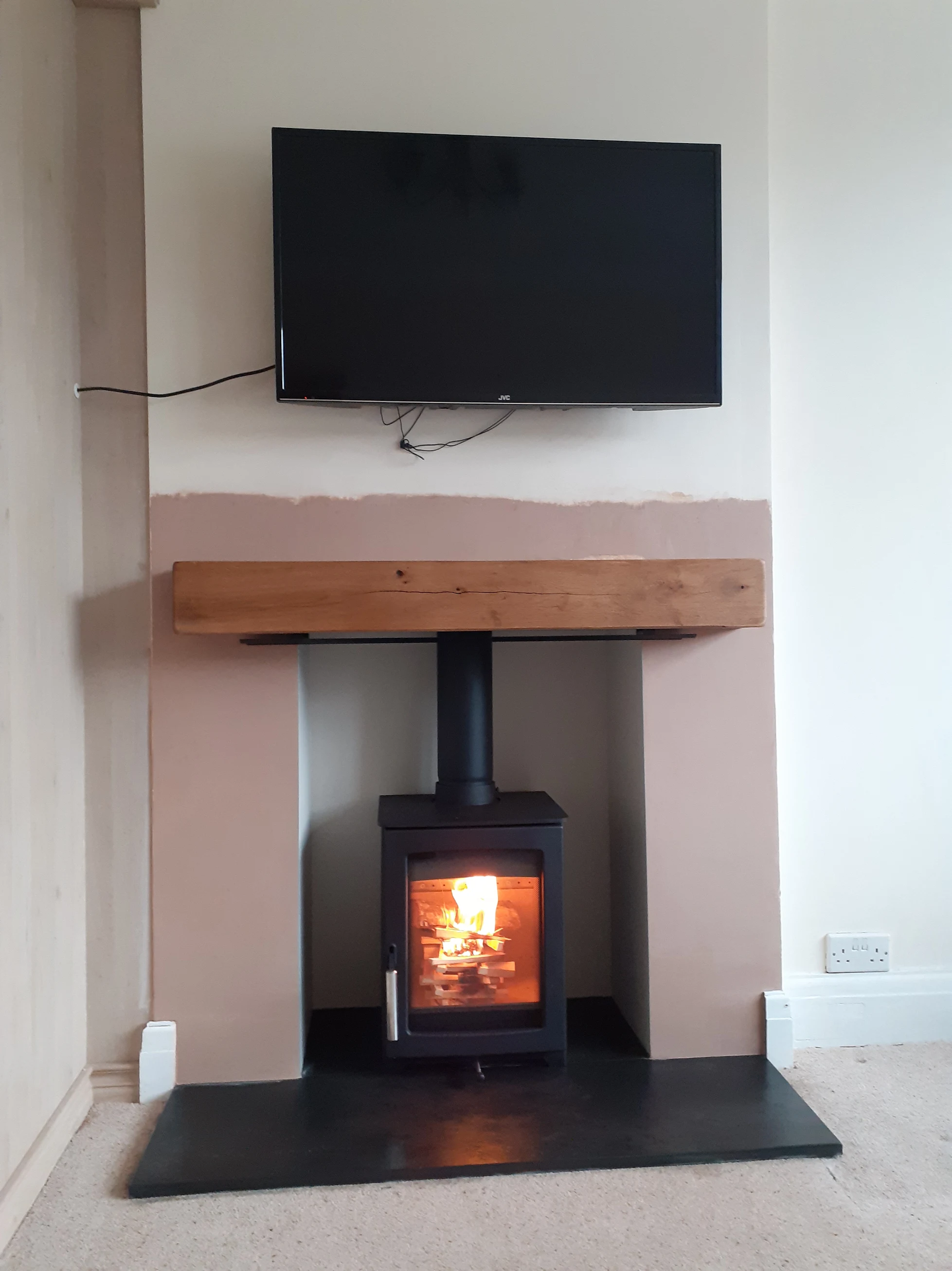 Two wood burning stoves supplied and fitted by The Fireplace & Stove Co.