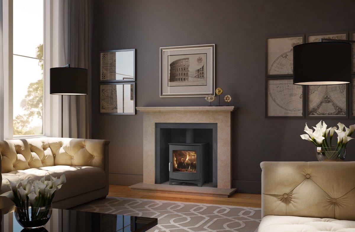A natural limestone fireplace with an inset wood burning stove in a Yorkshire home