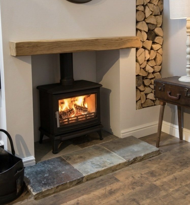 Five piece reclaimed flagstone flag hearth from The Fireplace & Stove Co.