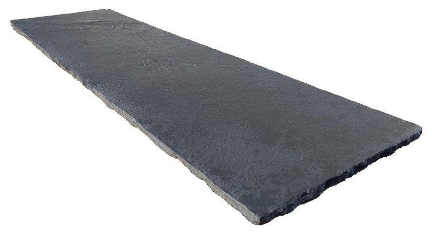 Old mill aged black limestone hearth from The Fireplace & Stove Co.