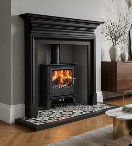 Clock Blithfield 8 installed in a black fireplace surround with a patterned hearth