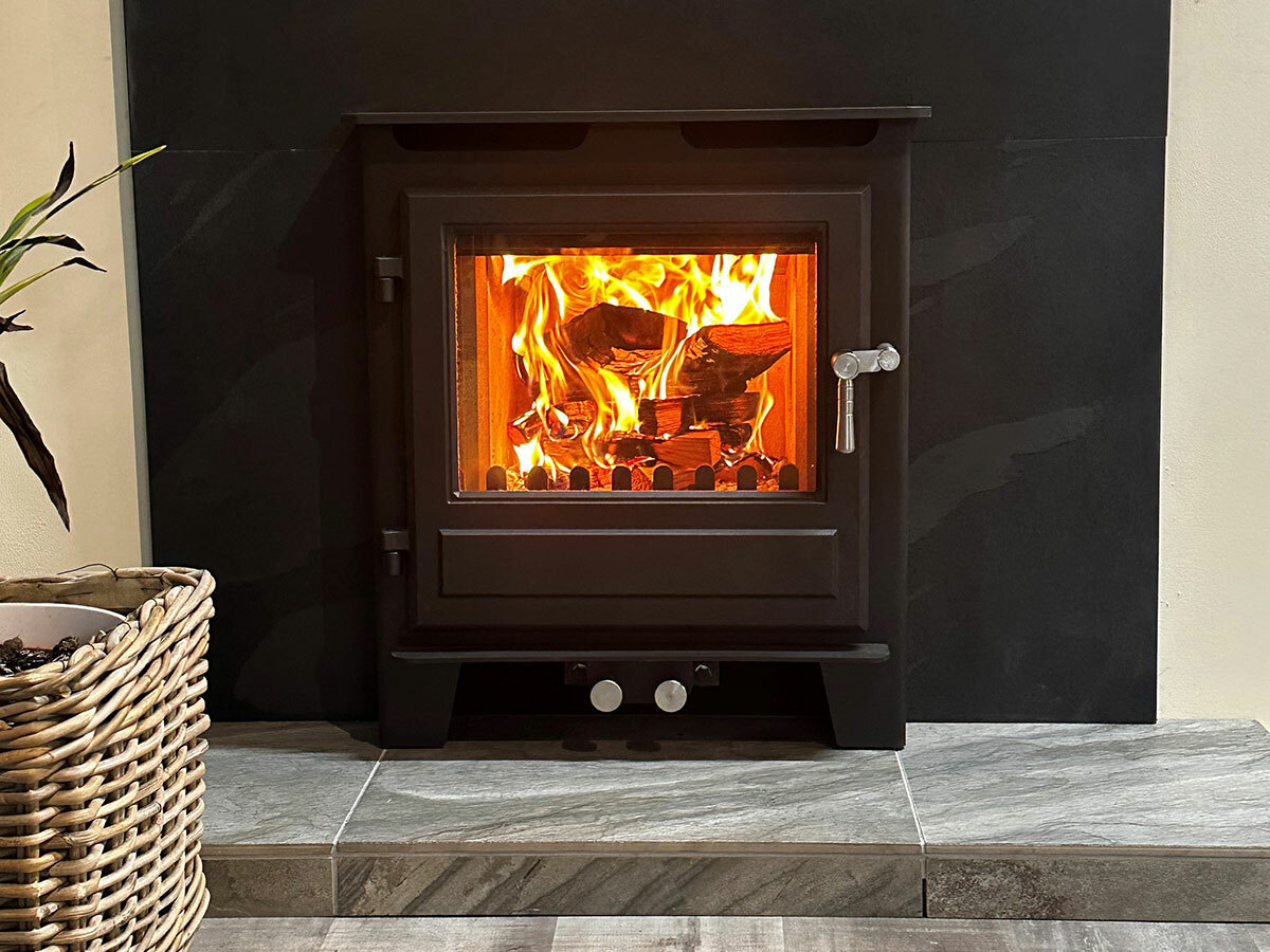 Clock Blithfield Inset stove in a fireplace setting