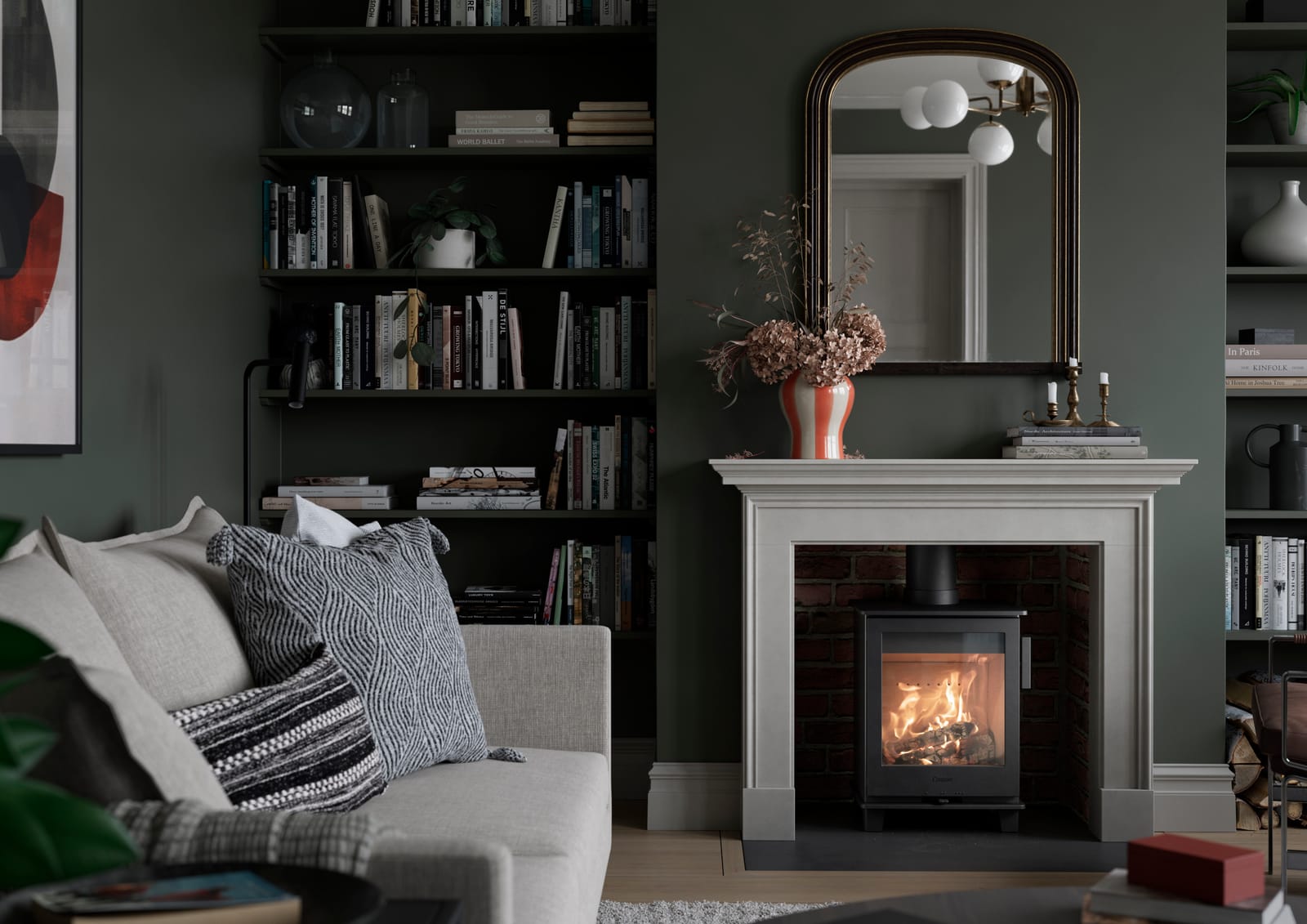 Contura 110 wood burning stove in a fireplace room setting