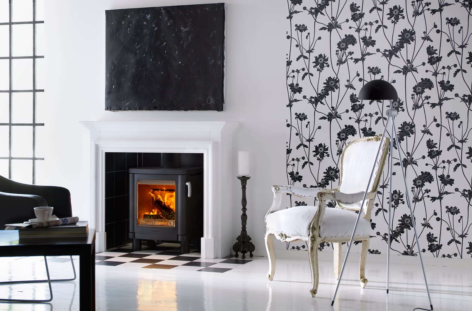 Contura 51L wood burning stove in a fireplace room setting