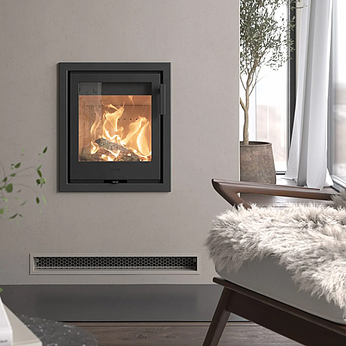 Contura i1 cassette built into a fireplace opening