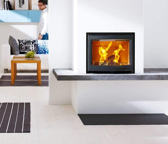 Contura i5 cassette woodburning stove installed in a modern fireplace