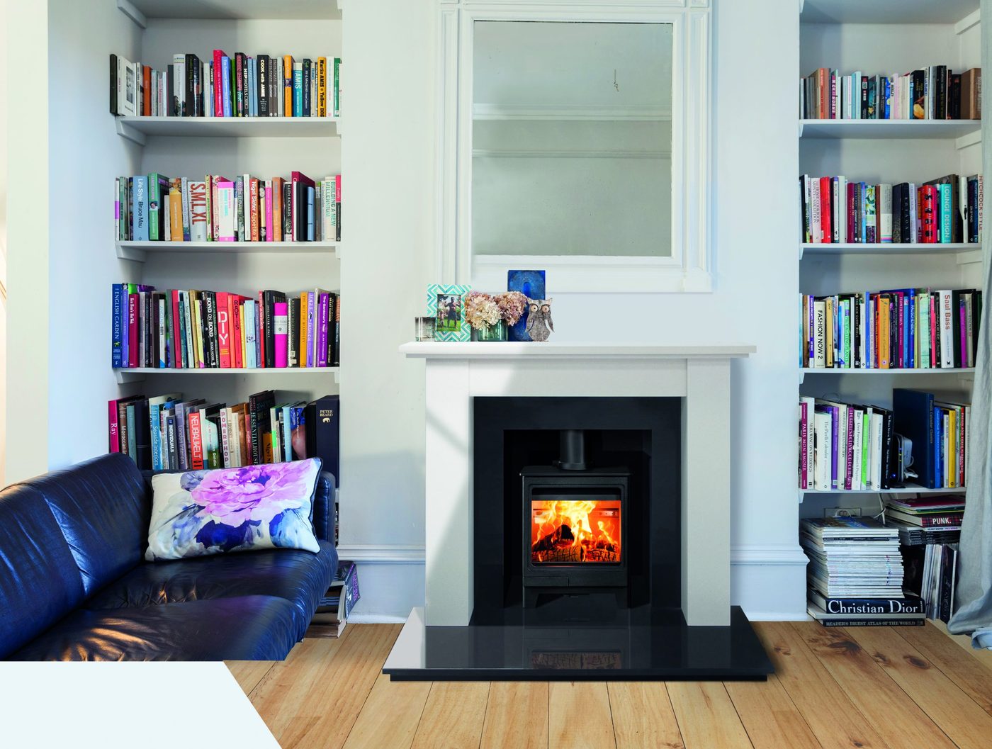Hunter Allure 4 stove installed in a fireplace setting