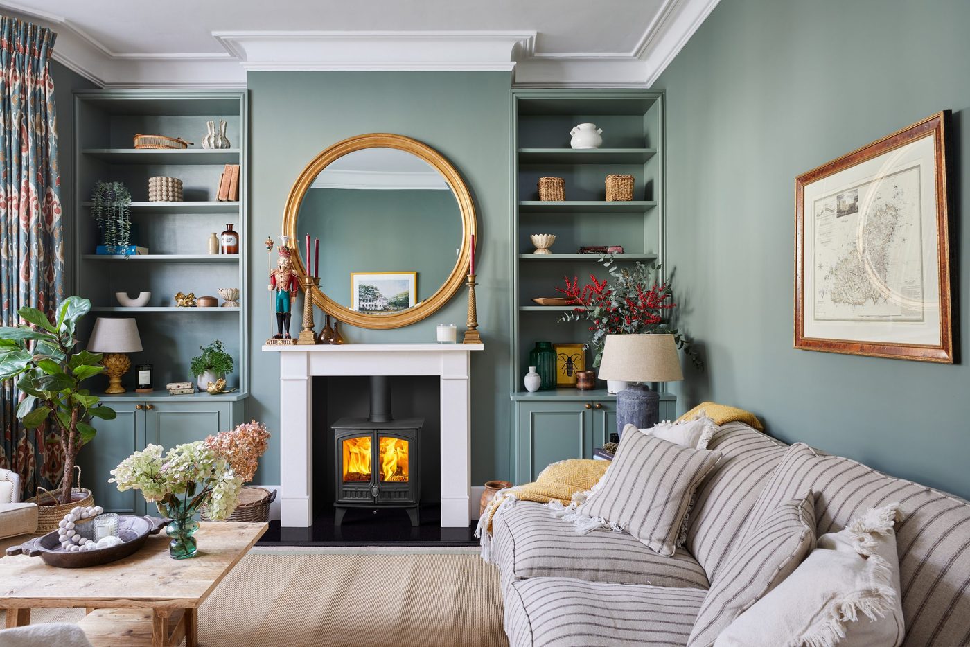 Hunter Herald 5 double-door stove installed in a traditional fireplace setting