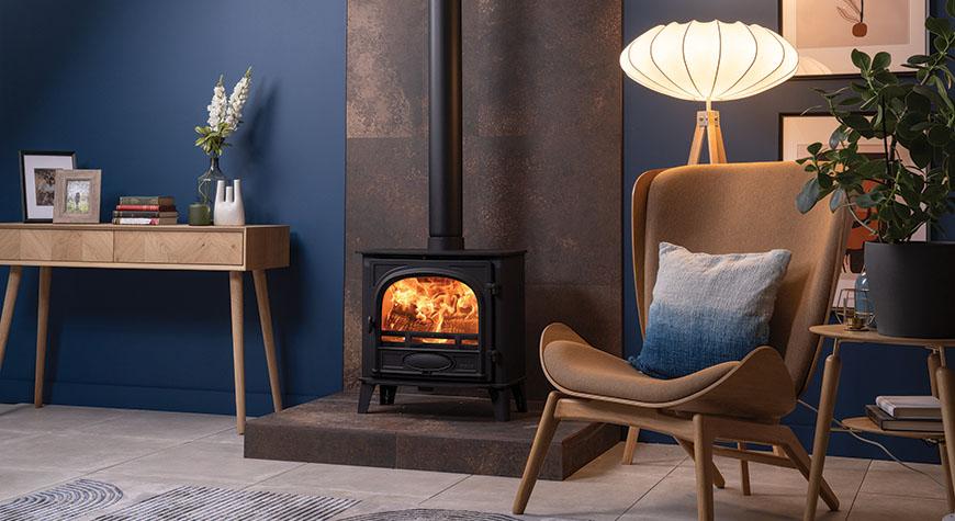 Stovax Stockton 5 Wide wood burning stove in a furnished room setting